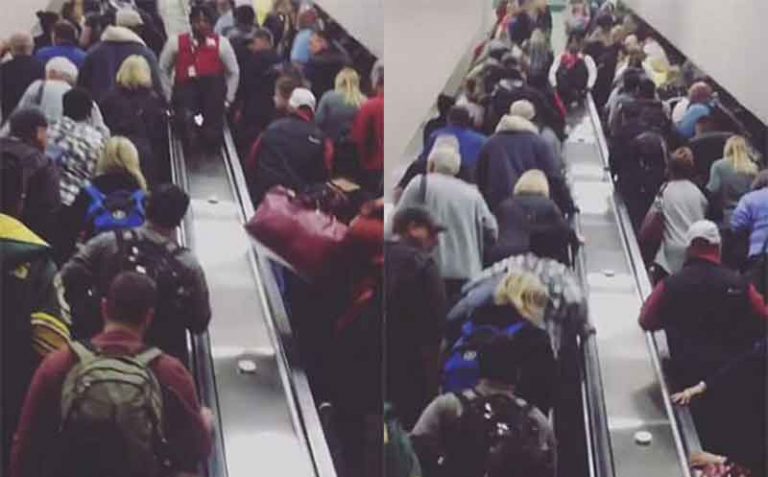 Tenangkan Massa di Bandara Atlanta, Petugas Ini Meluncur dari Eskalator